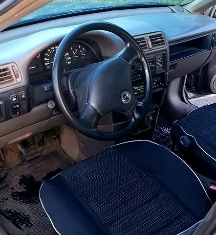 Серый Опель Вектра, объемом двигателя 2 л и пробегом 335 тыс. км за 1950 $, фото 3 на Automoto.ua