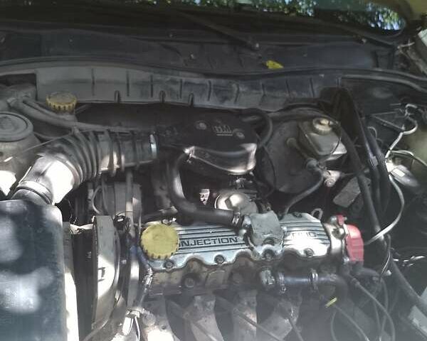 Серый Опель Вектра, объемом двигателя 1.8 л и пробегом 435 тыс. км за 650 $, фото 13 на Automoto.ua