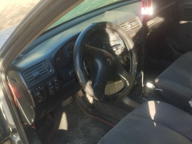 Серый Опель Вектра, объемом двигателя 0 л и пробегом 245 тыс. км за 300 $, фото 5 на Automoto.ua