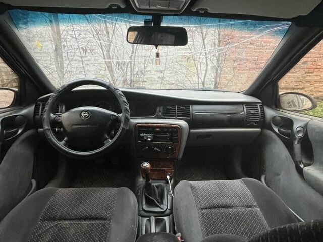 Серый Опель Вектра, объемом двигателя 1.6 л и пробегом 480 тыс. км за 1800 $, фото 4 на Automoto.ua