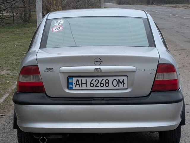 Серый Опель Вектра, объемом двигателя 1.8 л и пробегом 234 тыс. км за 1999 $, фото 3 на Automoto.ua