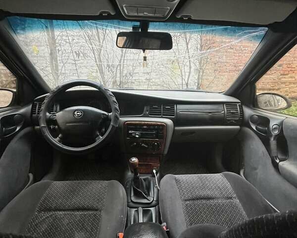 Серый Опель Вектра, объемом двигателя 1.6 л и пробегом 340 тыс. км за 1900 $, фото 9 на Automoto.ua