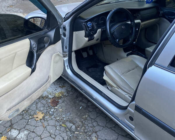 Серый Опель Вектра, объемом двигателя 1.6 л и пробегом 400 тыс. км за 1650 $, фото 6 на Automoto.ua