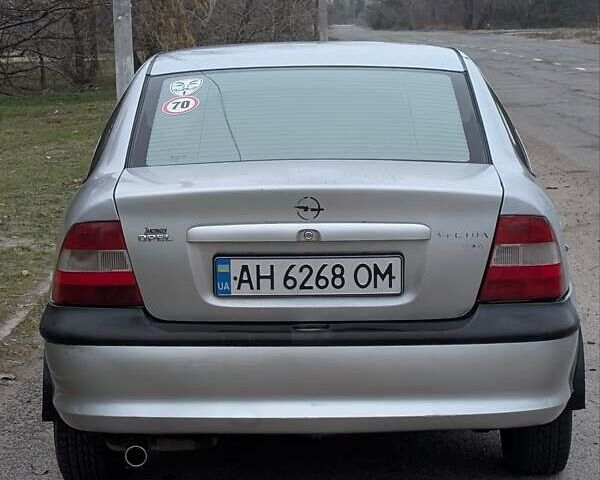 Серый Опель Вектра, объемом двигателя 1.8 л и пробегом 234 тыс. км за 1999 $, фото 8 на Automoto.ua