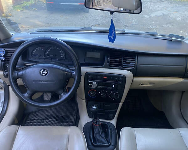 Серый Опель Вектра, объемом двигателя 1.6 л и пробегом 400 тыс. км за 1650 $, фото 7 на Automoto.ua