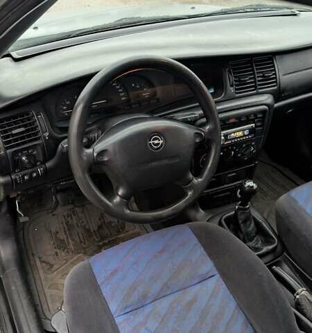 Серый Опель Вектра, объемом двигателя 1.8 л и пробегом 234 тыс. км за 1999 $, фото 7 на Automoto.ua