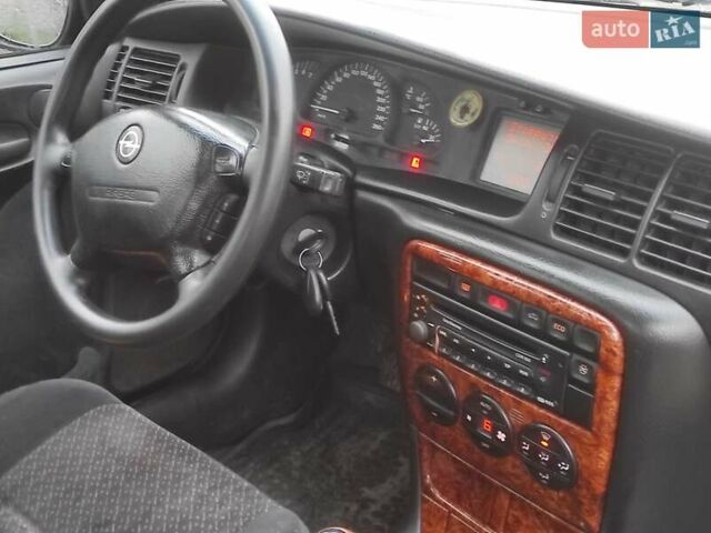 Серый Опель Вектра, объемом двигателя 2 л и пробегом 292 тыс. км за 1900 $, фото 3 на Automoto.ua