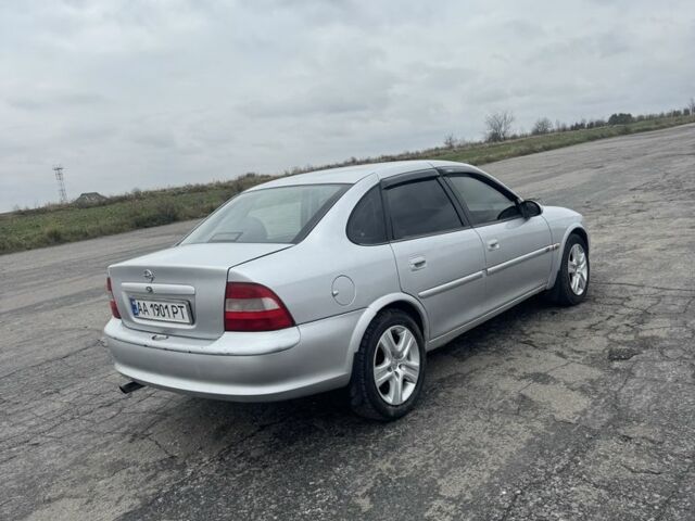 Сірий Опель Вектра, об'ємом двигуна 2 л та пробігом 319 тис. км за 1750 $, фото 4 на Automoto.ua