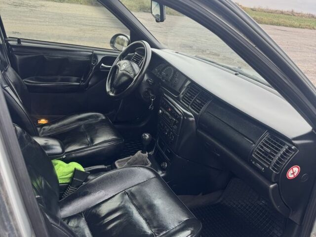 Сірий Опель Вектра, об'ємом двигуна 2 л та пробігом 319 тис. км за 1750 $, фото 12 на Automoto.ua