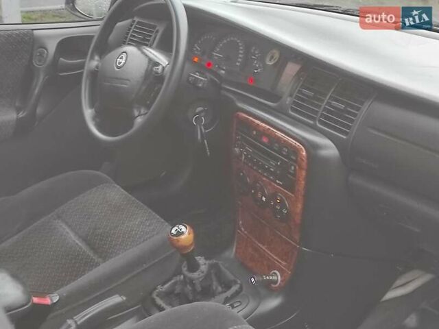 Серый Опель Вектра, объемом двигателя 2 л и пробегом 292 тыс. км за 1900 $, фото 8 на Automoto.ua