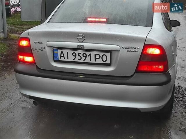 Серый Опель Вектра, объемом двигателя 2 л и пробегом 292 тыс. км за 1900 $, фото 2 на Automoto.ua