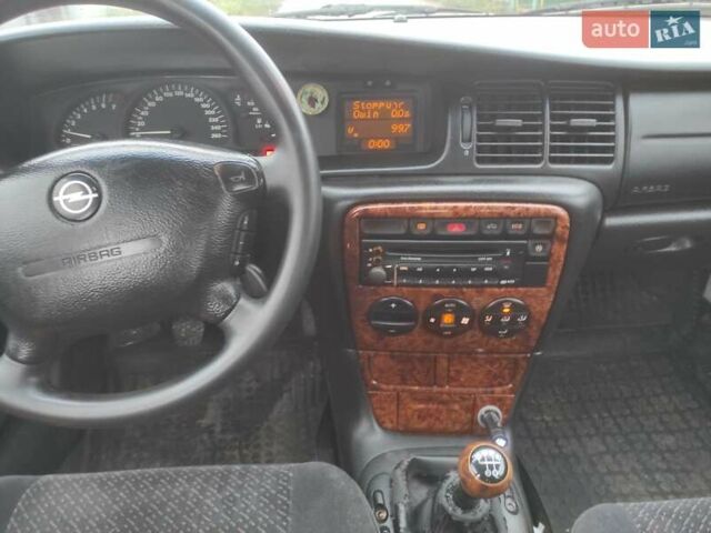 Серый Опель Вектра, объемом двигателя 2 л и пробегом 292 тыс. км за 1900 $, фото 11 на Automoto.ua
