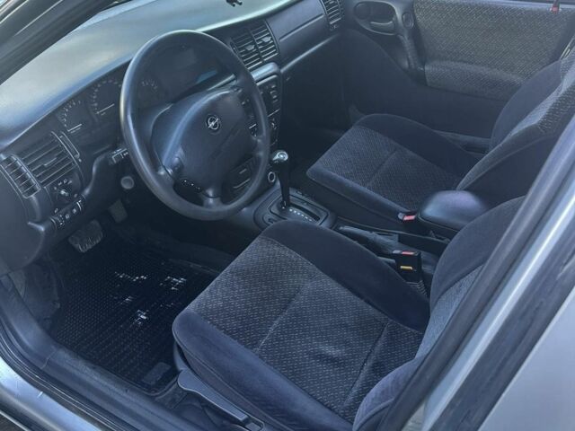 Серый Опель Вектра, объемом двигателя 1.8 л и пробегом 256 тыс. км за 2700 $, фото 4 на Automoto.ua