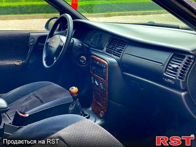 Сірий Опель Вектра, об'ємом двигуна 2 л та пробігом 250 тис. км за 1450 $, фото 7 на Automoto.ua