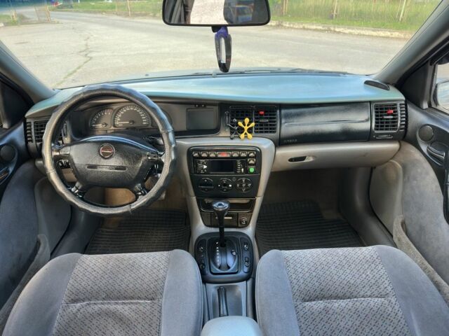 Сірий Опель Вектра, об'ємом двигуна 2 л та пробігом 335 тис. км за 1950 $, фото 5 на Automoto.ua