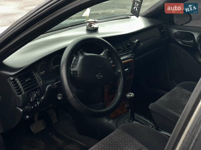 Серый Опель Вектра, объемом двигателя 2 л и пробегом 333 тыс. км за 2400 $, фото 5 на Automoto.ua