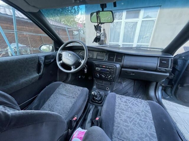 Серый Опель Вектра, объемом двигателя 1.6 л и пробегом 279 тыс. км за 2250 $, фото 5 на Automoto.ua