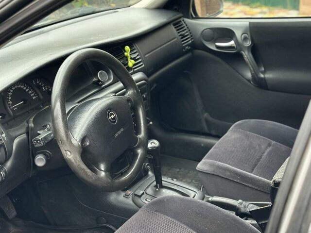 Серый Опель Вектра, объемом двигателя 2 л и пробегом 290 тыс. км за 1750 $, фото 7 на Automoto.ua