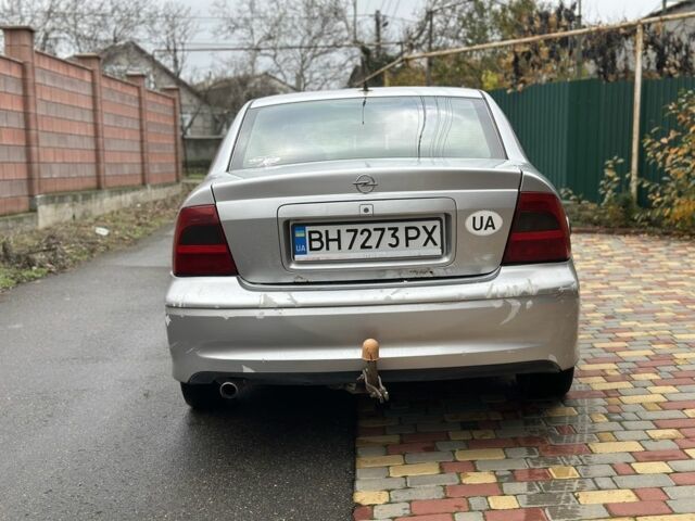 Серый Опель Вектра, объемом двигателя 2 л и пробегом 290 тыс. км за 1750 $, фото 4 на Automoto.ua