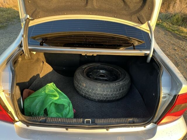 Серый Опель Вектра, объемом двигателя 1.8 л и пробегом 358 тыс. км за 2000 $, фото 6 на Automoto.ua