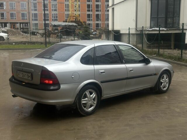 Серый Опель Вектра, объемом двигателя 1.8 л и пробегом 242 тыс. км за 1999 $, фото 4 на Automoto.ua