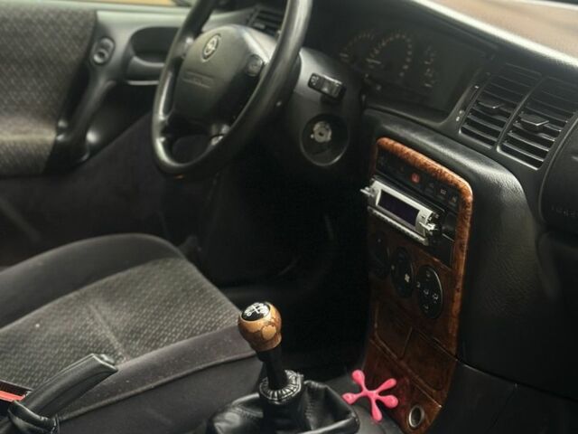 Серый Опель Вектра, объемом двигателя 1.8 л и пробегом 242 тыс. км за 1999 $, фото 6 на Automoto.ua