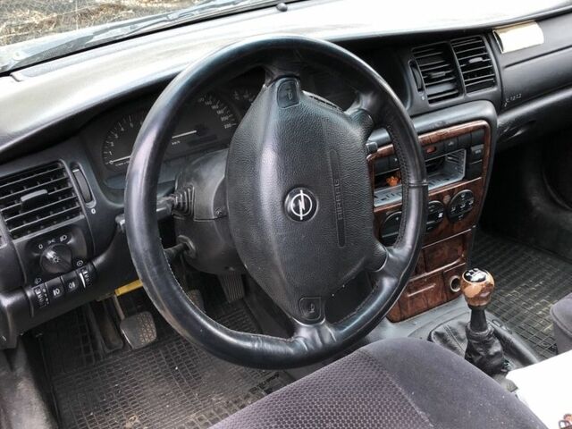 Серый Опель Вектра, объемом двигателя 2 л и пробегом 385 тыс. км за 2063 $, фото 2 на Automoto.ua