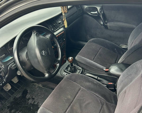 Серый Опель Вектра, объемом двигателя 2 л и пробегом 392 тыс. км за 2750 $, фото 9 на Automoto.ua