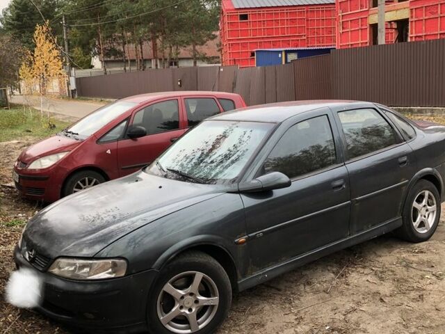Серый Опель Вектра, объемом двигателя 2 л и пробегом 385 тыс. км за 2063 $, фото 1 на Automoto.ua