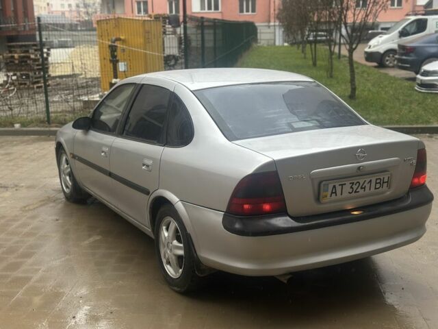 Серый Опель Вектра, объемом двигателя 1.8 л и пробегом 242 тыс. км за 1999 $, фото 5 на Automoto.ua
