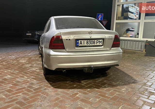 Сірий Опель Вектра, об'ємом двигуна 1.8 л та пробігом 320 тис. км за 1950 $, фото 4 на Automoto.ua