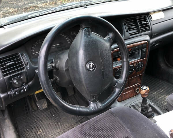 Серый Опель Вектра, объемом двигателя 2 л и пробегом 380 тыс. км за 2000 $, фото 2 на Automoto.ua