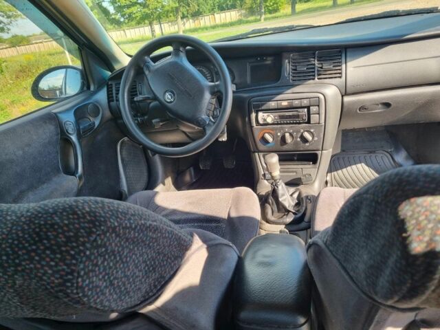 Серый Опель Вектра, объемом двигателя 2 л и пробегом 280 тыс. км за 2350 $, фото 5 на Automoto.ua