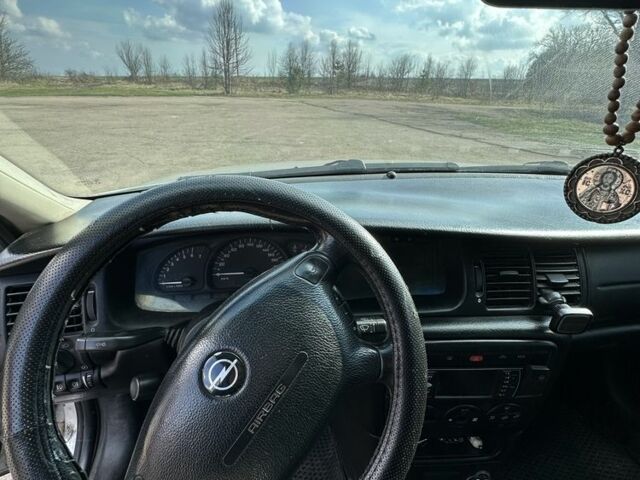 Серый Опель Вектра, объемом двигателя 1.8 л и пробегом 340 тыс. км за 2799 $, фото 19 на Automoto.ua