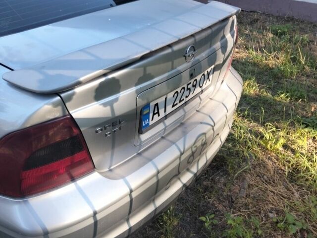 Серый Опель Вектра, объемом двигателя 2 л и пробегом 285 тыс. км за 2300 $, фото 2 на Automoto.ua