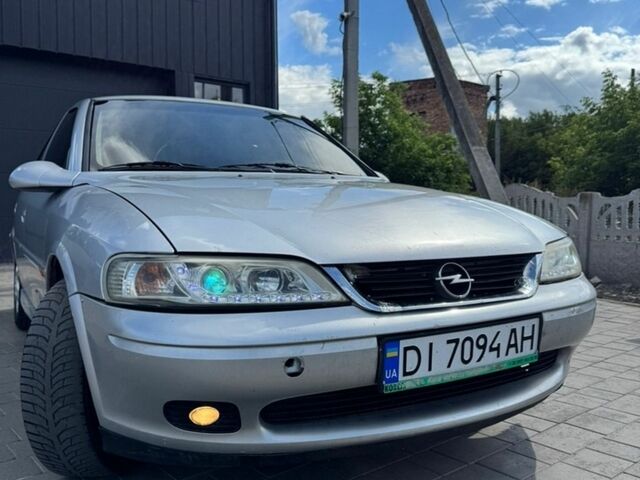 Сірий Опель Вектра, об'ємом двигуна 1.6 л та пробігом 384 тис. км за 2000 $, фото 13 на Automoto.ua
