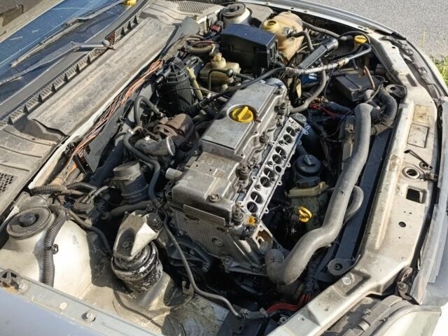 Серый Опель Вектра, объемом двигателя 2 л и пробегом 1 тыс. км за 572 $, фото 1 на Automoto.ua