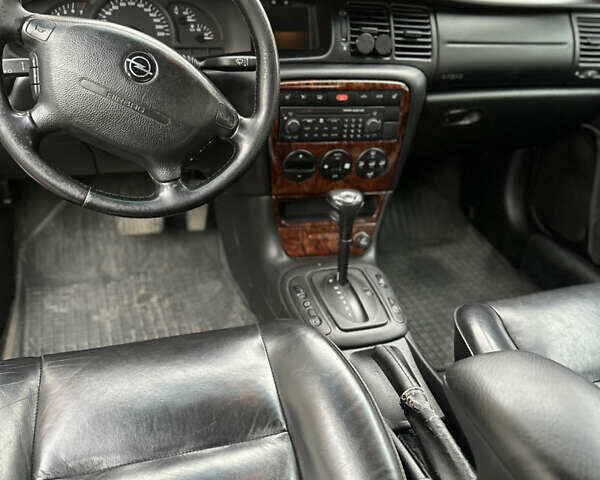 Сірий Опель Вектра, об'ємом двигуна 1.8 л та пробігом 234 тис. км за 3200 $, фото 8 на Automoto.ua