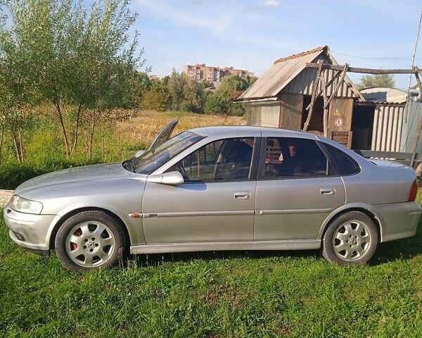 Серый Опель Вектра, объемом двигателя 2 л и пробегом 293 тыс. км за 3100 $, фото 9 на Automoto.ua