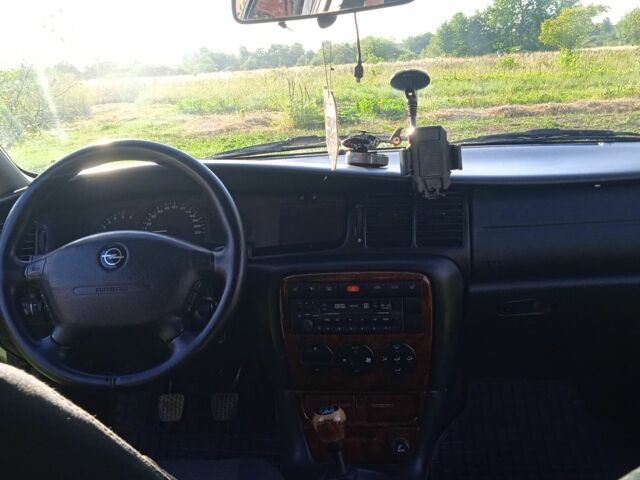 Серый Опель Вектра, объемом двигателя 2 л и пробегом 293 тыс. км за 2890 $, фото 4 на Automoto.ua