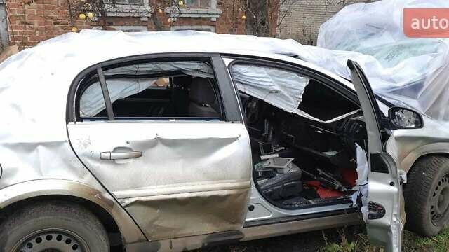 Серый Опель Вектра, объемом двигателя 2.2 л и пробегом 300 тыс. км за 944 $, фото 1 на Automoto.ua