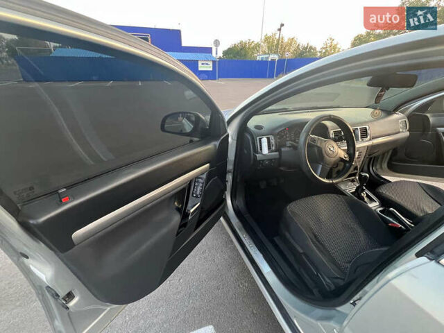 Серый Опель Вектра, объемом двигателя 1.91 л и пробегом 215 тыс. км за 5400 $, фото 10 на Automoto.ua