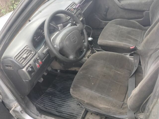 Серый Опель Вектра, объемом двигателя 2 л и пробегом 200 тыс. км за 1500 $, фото 4 на Automoto.ua