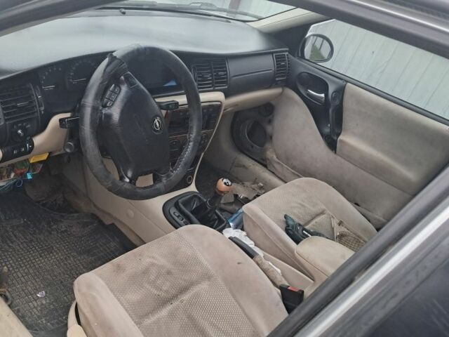 Серый Опель Вектра, объемом двигателя 2 л и пробегом 333 тыс. км за 500 $, фото 5 на Automoto.ua