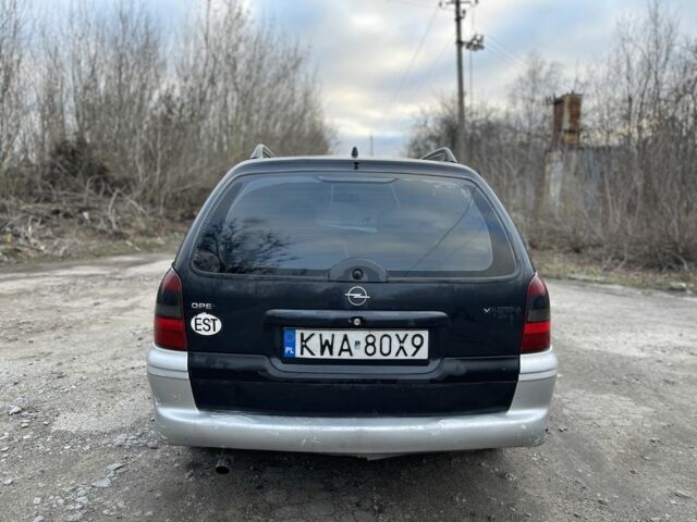 Серый Опель Вектра, объемом двигателя 2 л и пробегом 300 тыс. км за 932 $, фото 5 на Automoto.ua