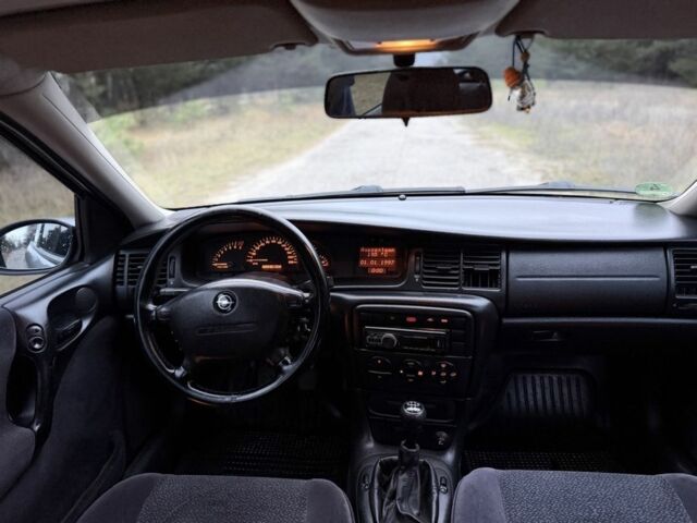 Серый Опель Вектра, объемом двигателя 1.8 л и пробегом 245 тыс. км за 2750 $, фото 11 на Automoto.ua