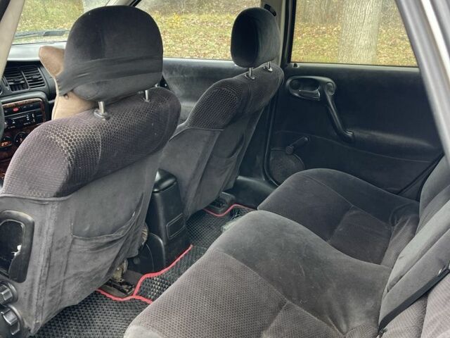 Серый Опель Вектра, объемом двигателя 2 л и пробегом 340 тыс. км за 1300 $, фото 12 на Automoto.ua