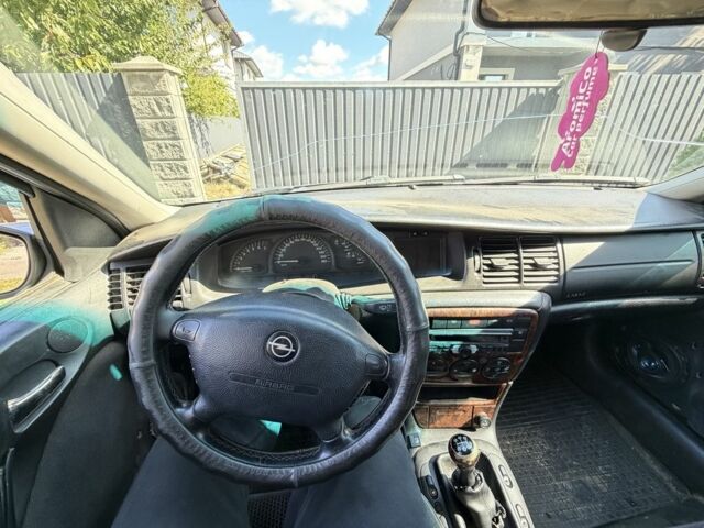 Сірий Опель Вектра, об'ємом двигуна 2 л та пробігом 245 тис. км за 1446 $, фото 7 на Automoto.ua