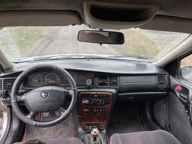 Серый Опель Вектра, объемом двигателя 2 л и пробегом 340 тыс. км за 1300 $, фото 11 на Automoto.ua