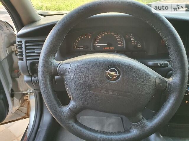 Серый Опель Вектра, объемом двигателя 2 л и пробегом 318 тыс. км за 2150 $, фото 20 на Automoto.ua
